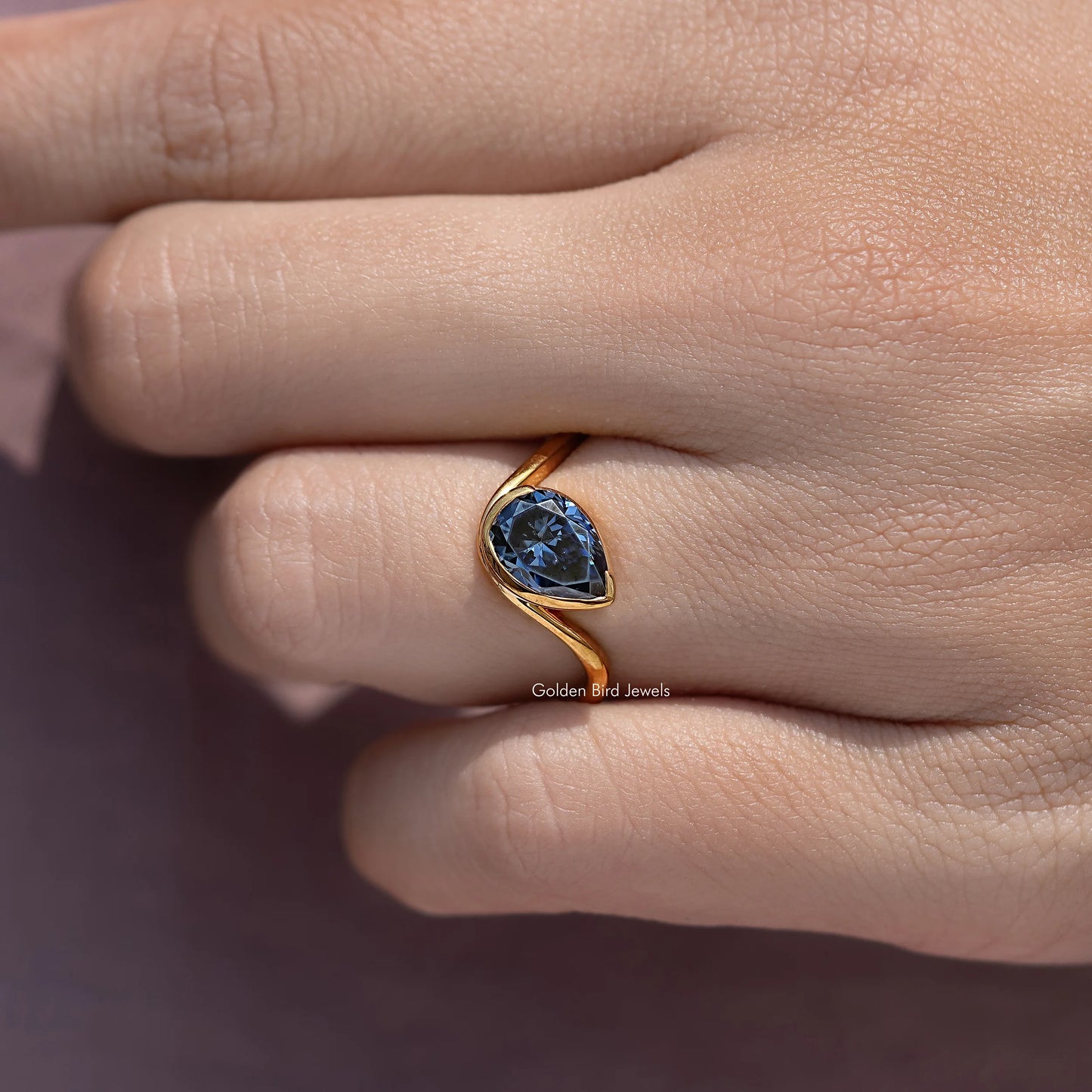 Pear Sapphire Moissanite Curved Solitaire Ring