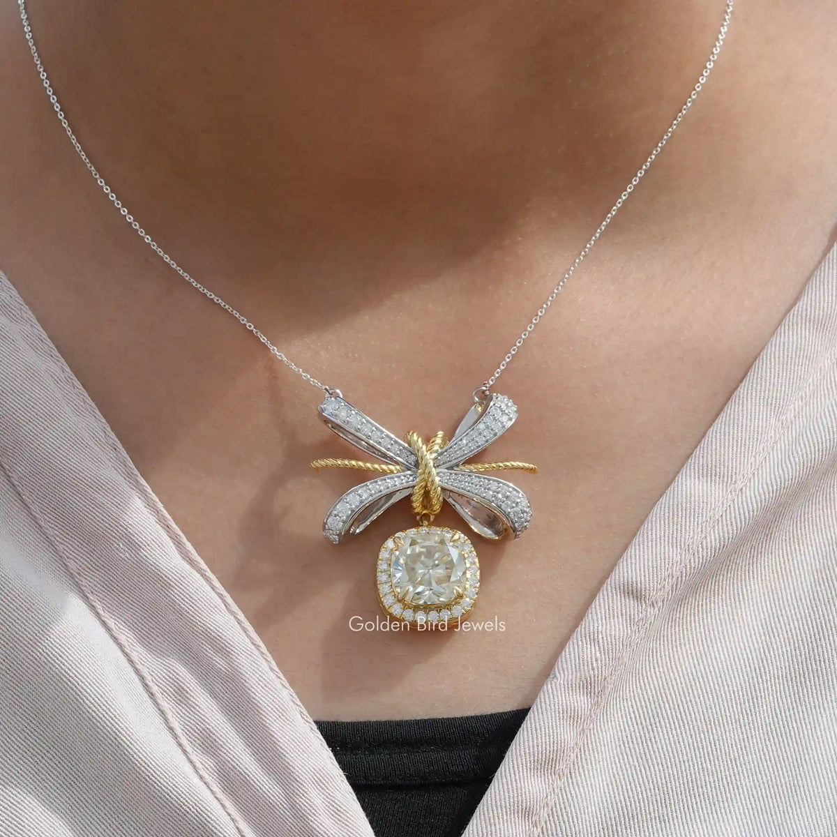In neck front view of cushion cut halo pendant