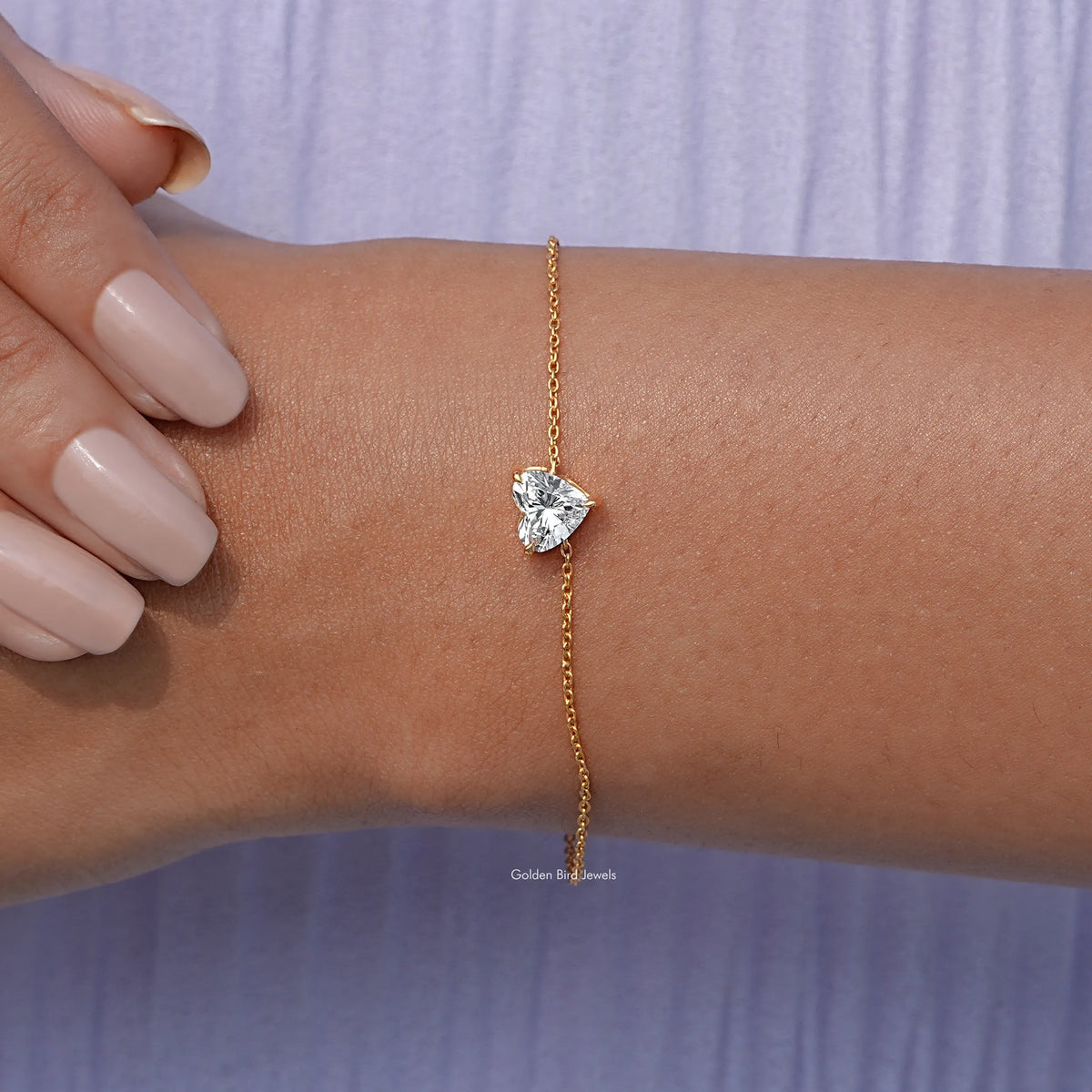 In hand view of lab diamond chain bracelet