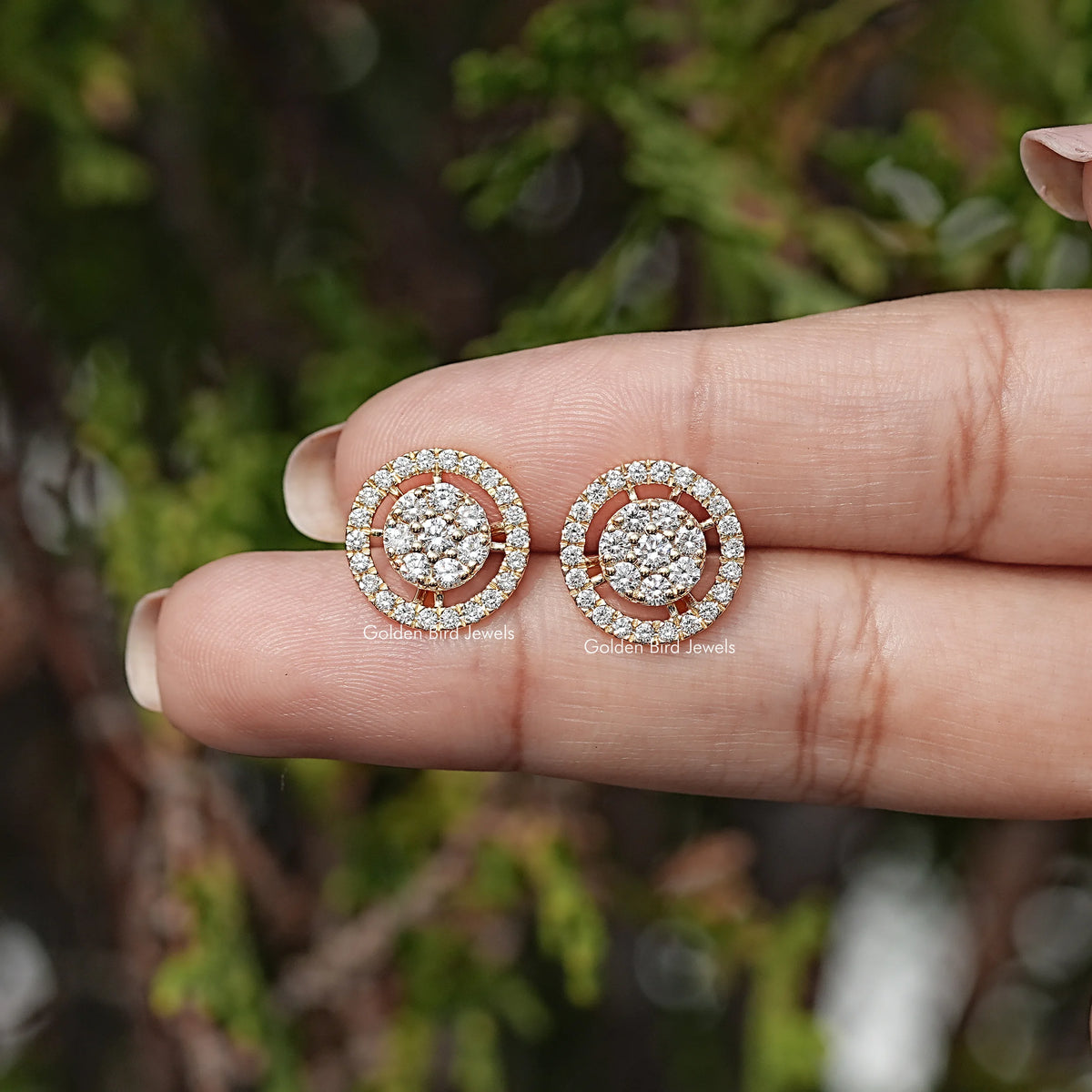 In Hand View Of Round Cut Lab Diamond Stud Earrings