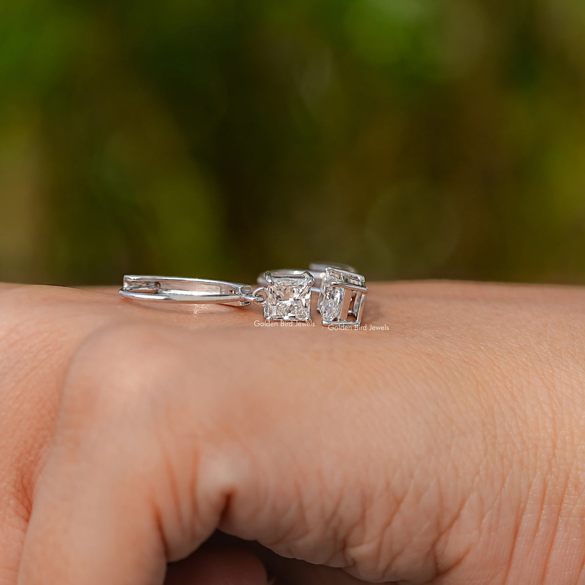 In Hand View Of Lab Diamond Drop Earrings