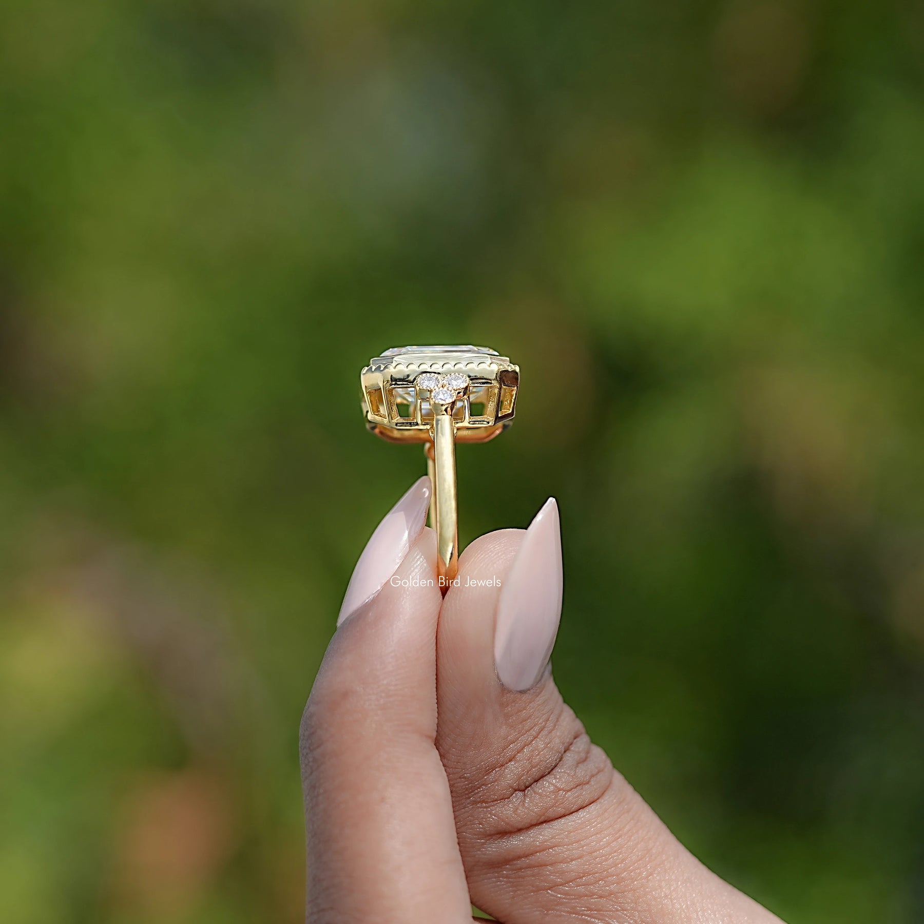 Side View Of Bezel Set Emerald Cut Ring