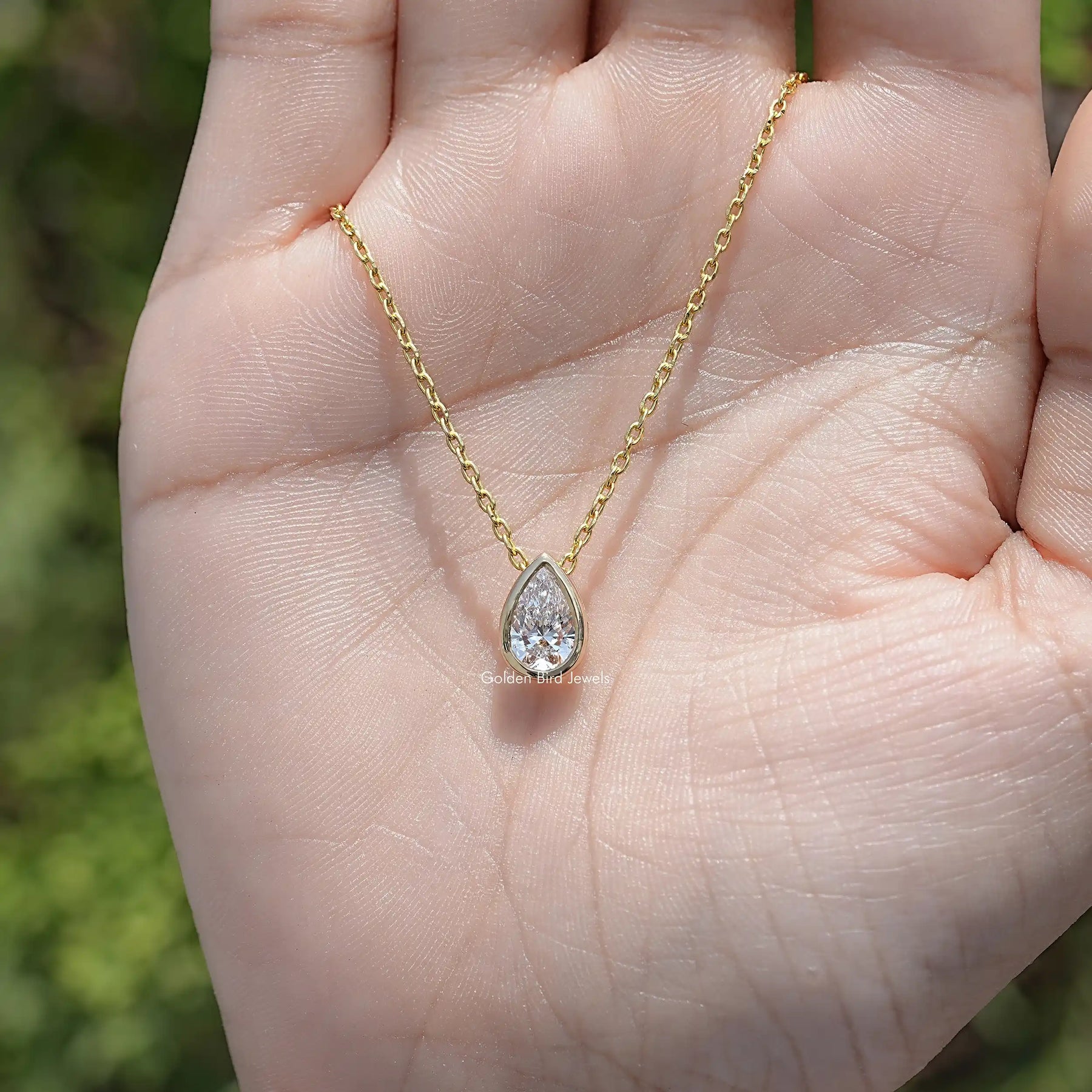 Top View of Pear Cut Bezel Set Solitaire Pendant