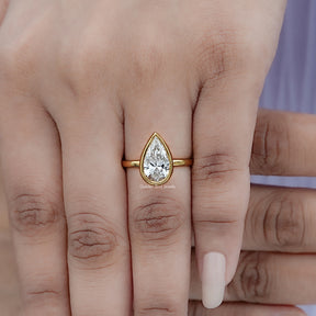 Top view of Bezel Set Pear Cut Diamond Solitaire Ring