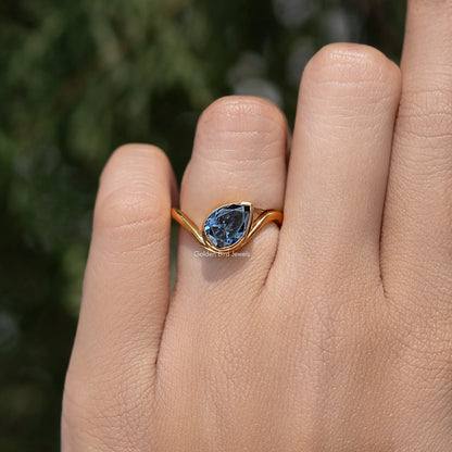 Pear Sapphire Moissanite Curved Solitaire Ring