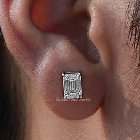 Close Up View Of Emerald Cut Diamond Solitaire Stud Earrings