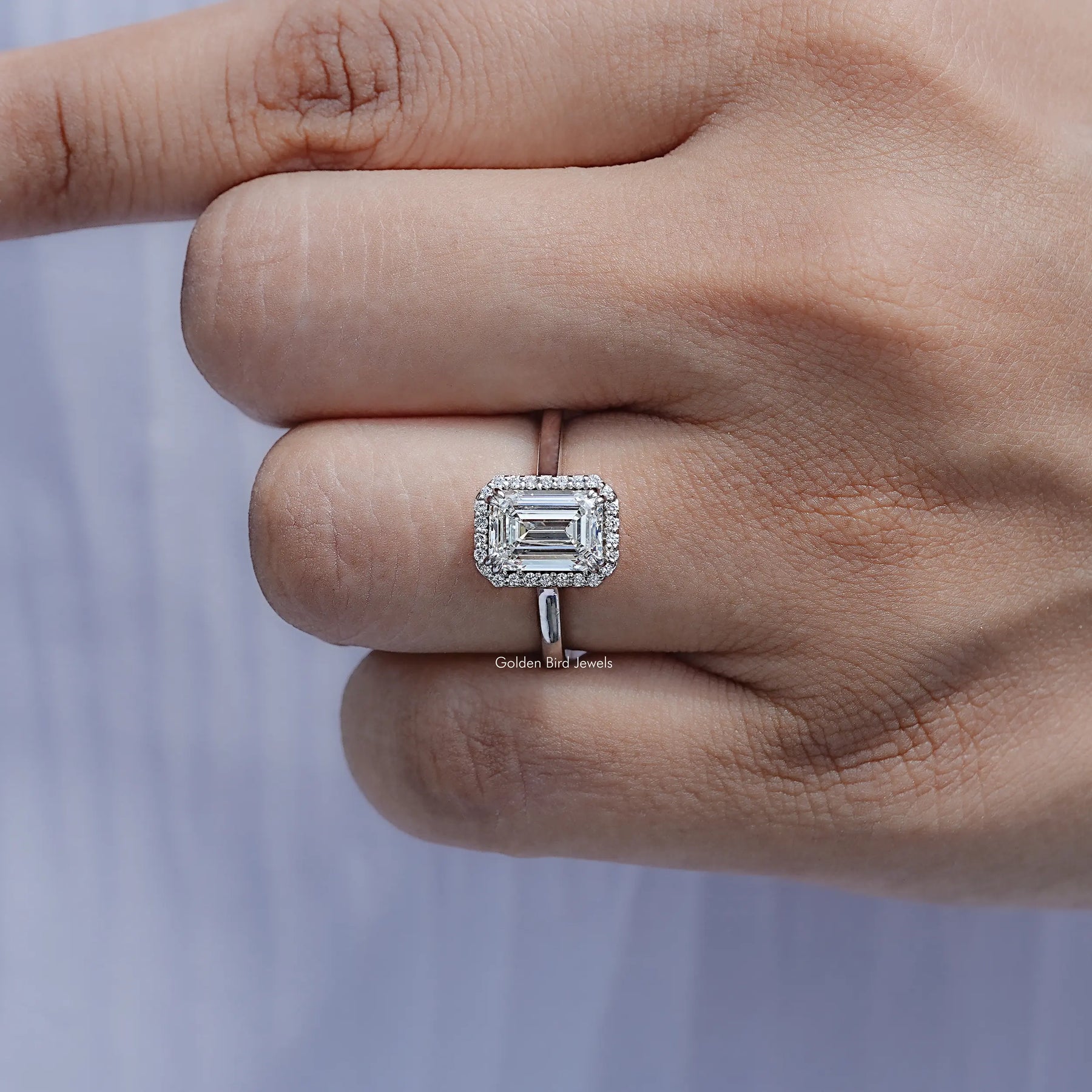 Close View Of Emerald Lab Diamond Halo Engagement Ring	