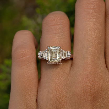 Criss And Trapezoid Cut Three Stone Engagement Ring