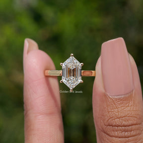 Step Cut Dutch Marquise Lab Diamond Ring held between fingers 