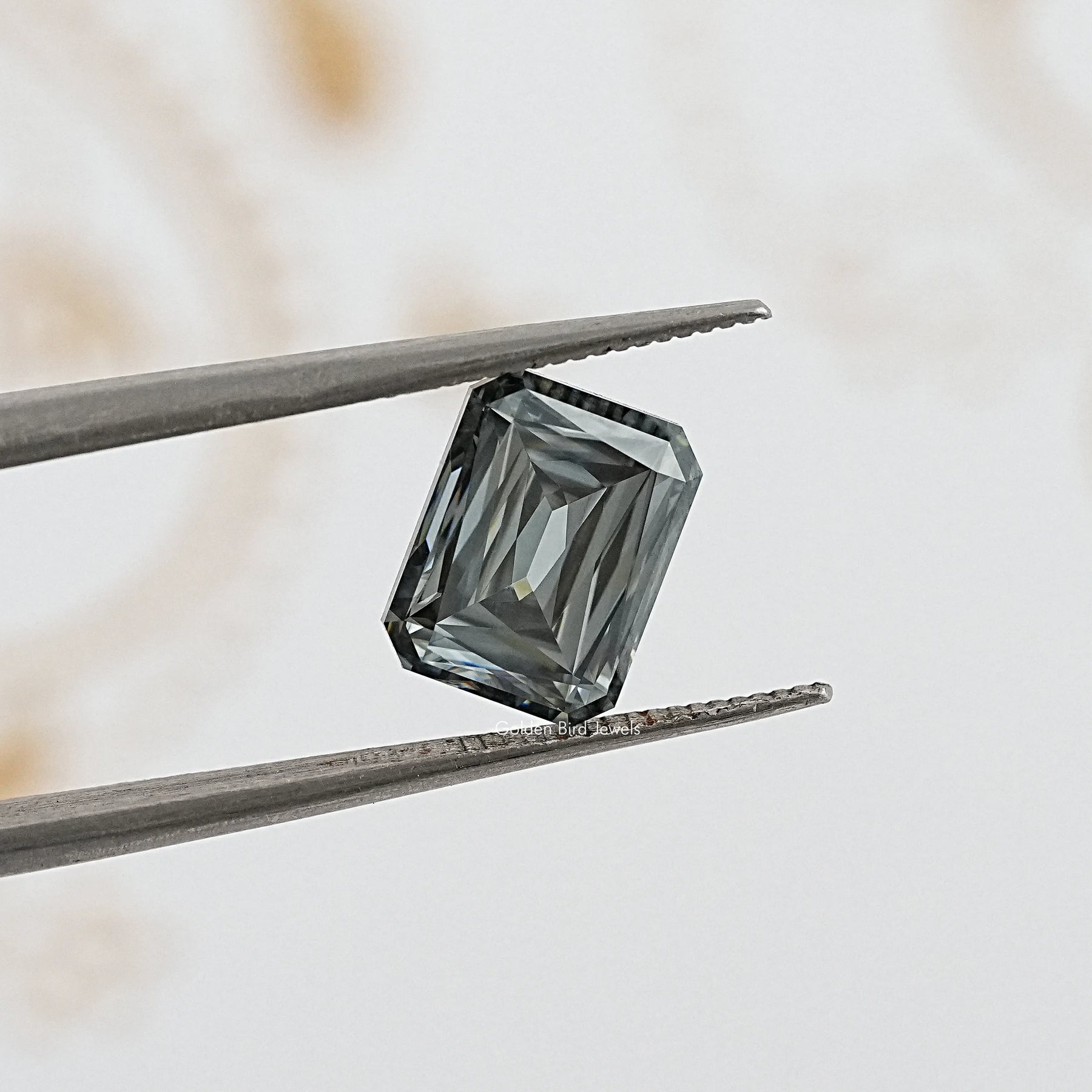 tweezers  View of Criss Cut Loose Moissanite