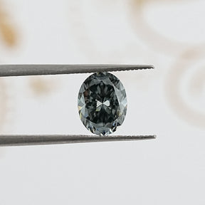 tweezers  View of Oval Cut Moissanite Loose Stone for Anniversary Rings