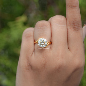 In finger view of Round Cut Solitaire Engagement Ring 
