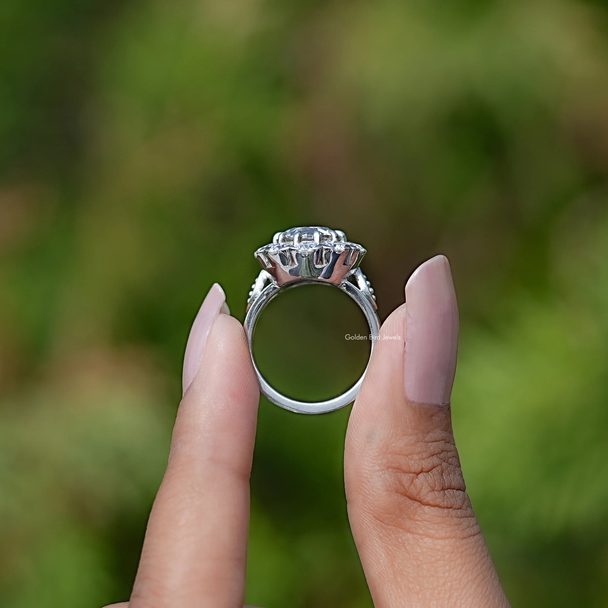 Back View of Old European Round Cut Engagement Ring In two fingers