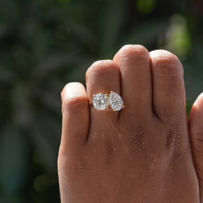 Pear And Round Cut Moissanite Toi Et Moi Ring
