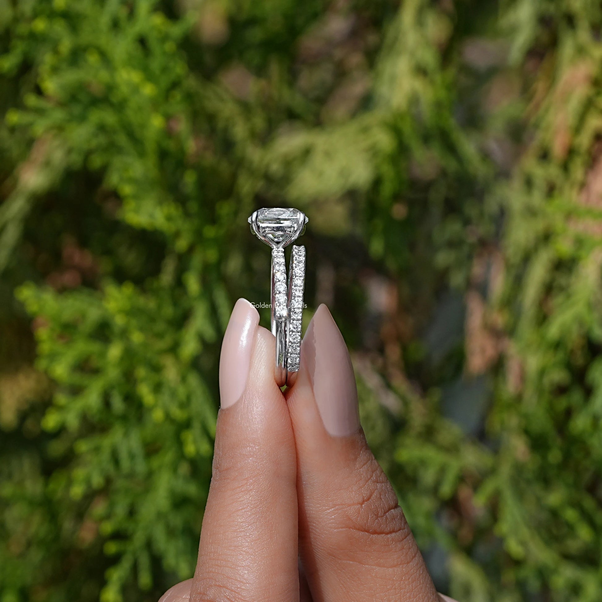 Side View of Lab Diamond Old Mine Cushion Cut Ring Set in two fingers