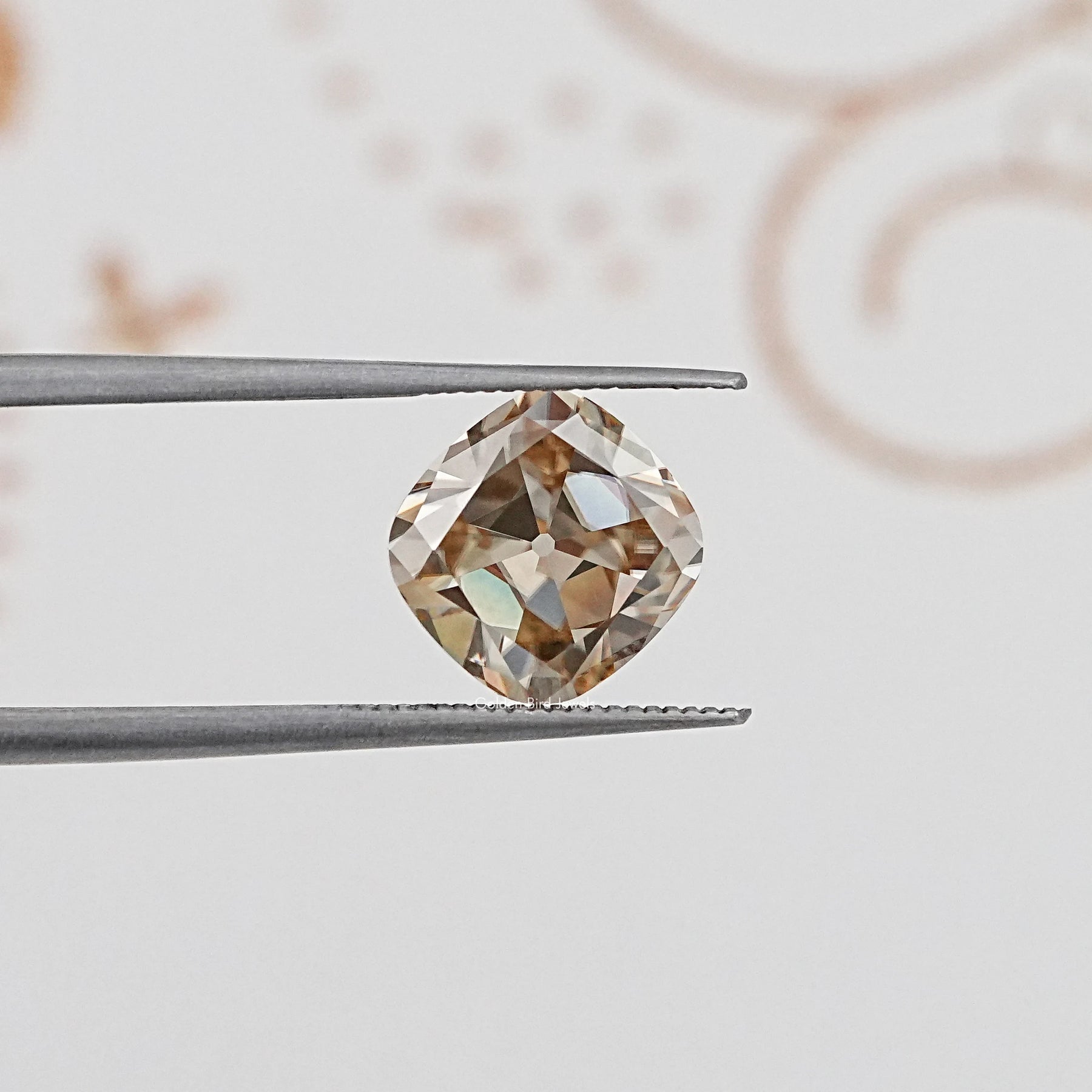 In Tweezer View Of Old Mine Cushion Cut Loose Moissanite Stone