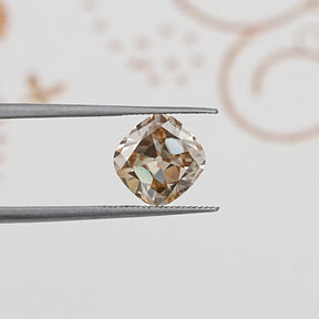 In Tweezer View Of Old Mine Cushion Cut Loose Moissanite Stone