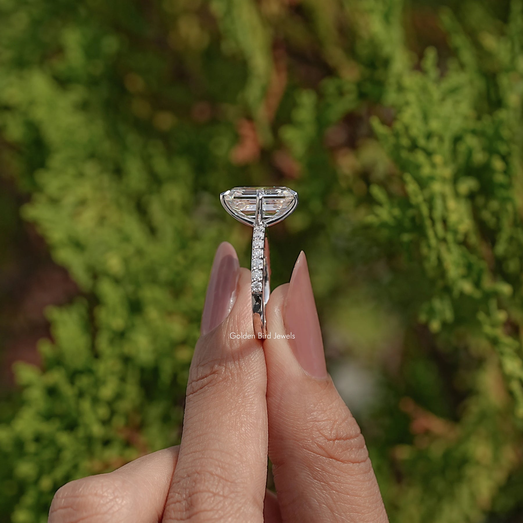 Side View Of Emerald Cut Moissanite Accent Ring
