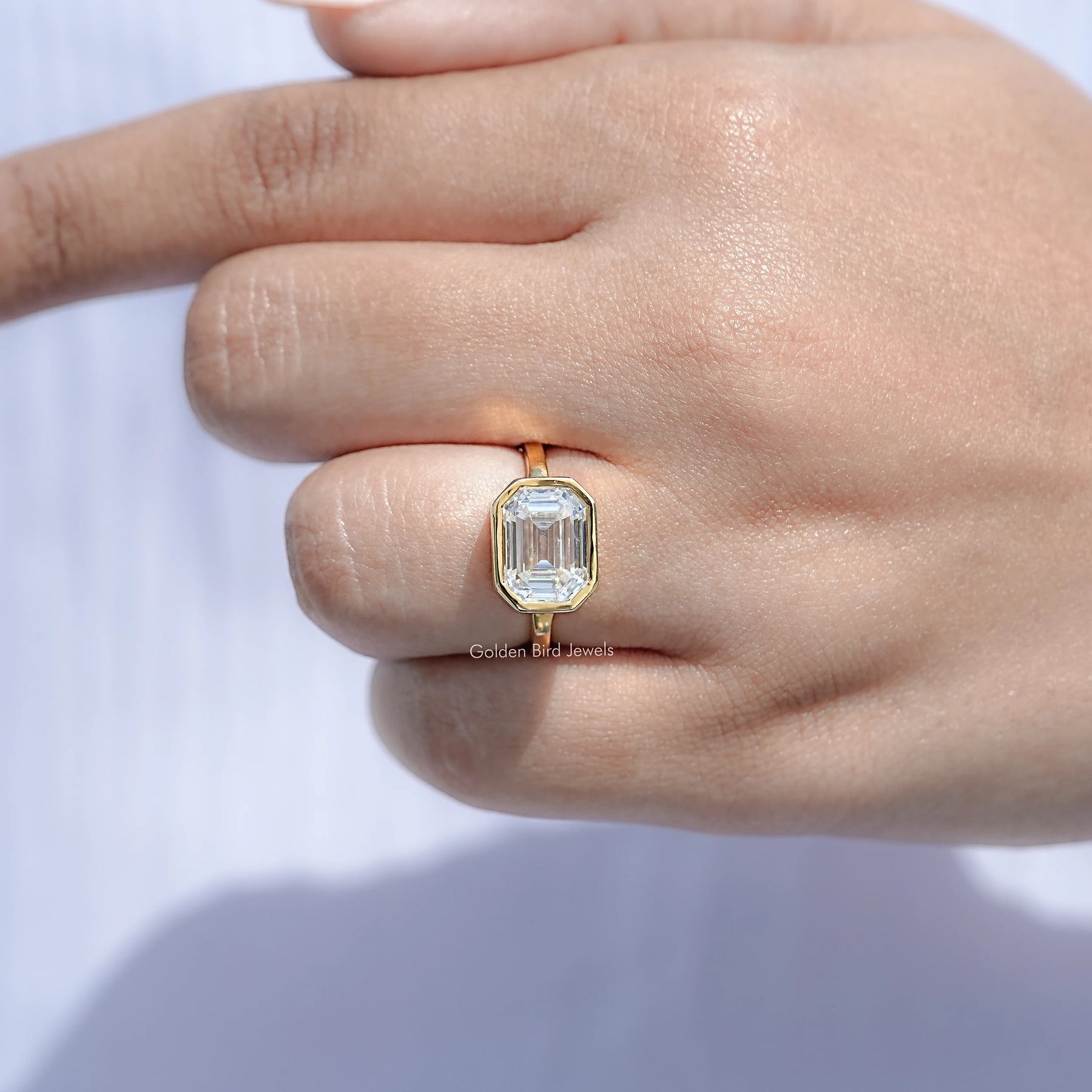 Top View Of East West Old Mine Moissanite Emerald Cut Ring