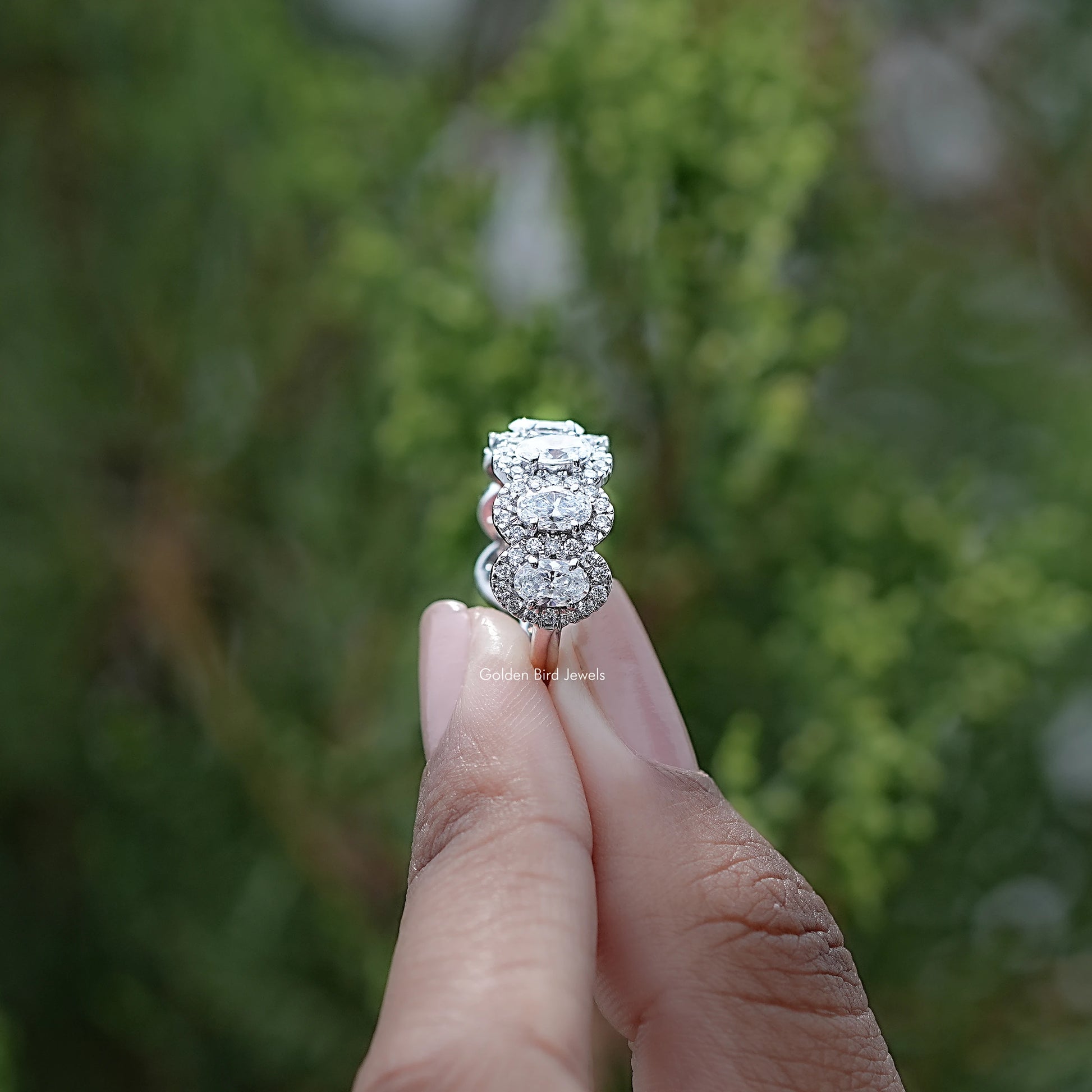 Side View of Oval Cut Lab Diamond Seven Stone Halo Band