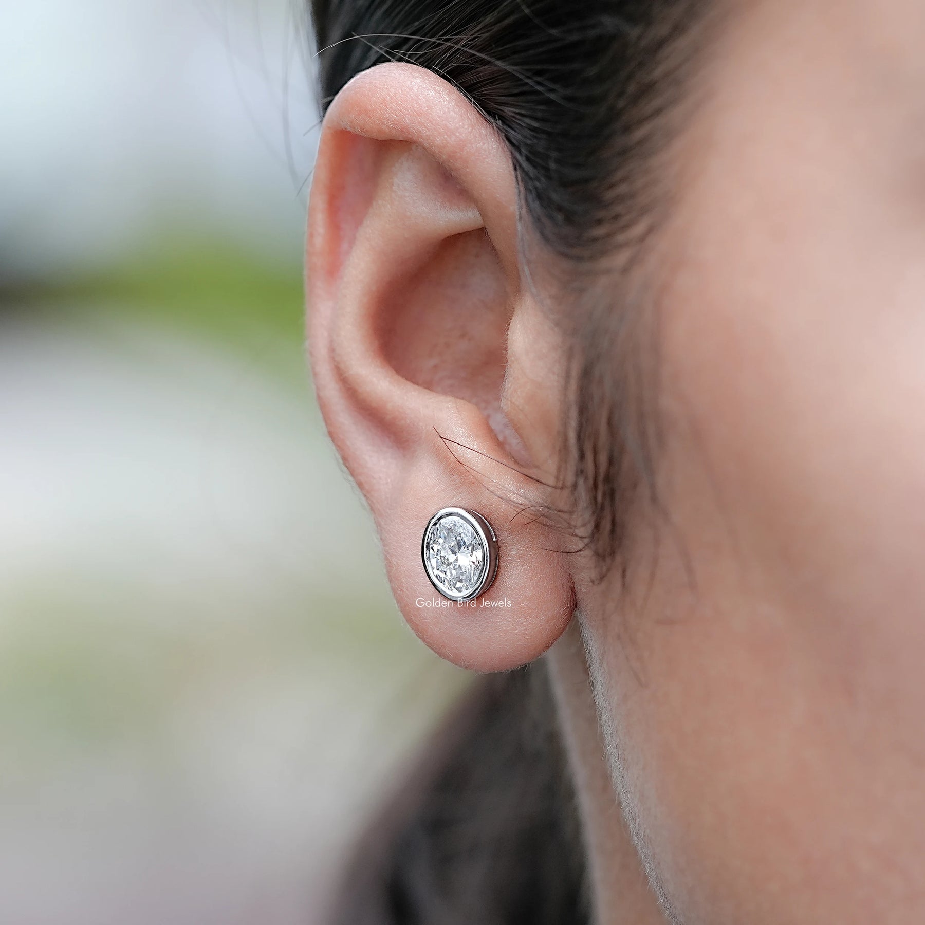 Side View of Oval Bezel Set Lab Diamond Stud Earrings