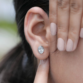 Display view of Stud Earrings with Bezel Set Oval Lab Diamond