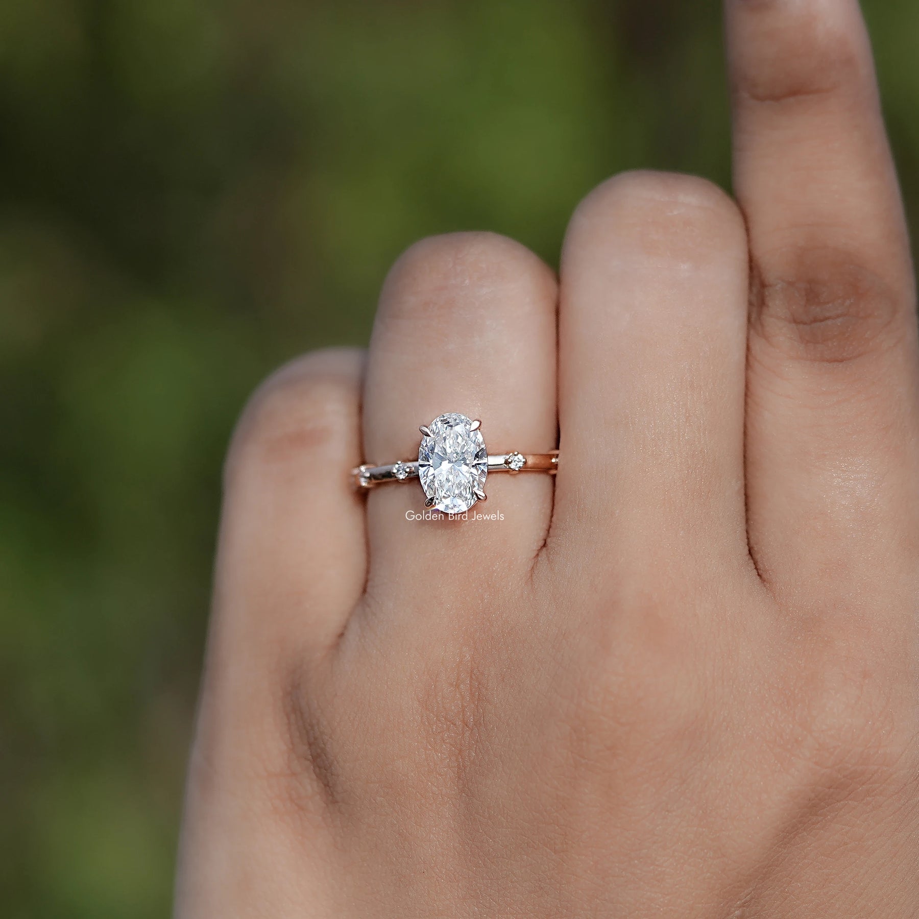 Front view of Oval Shaped Diamond Distance Ring