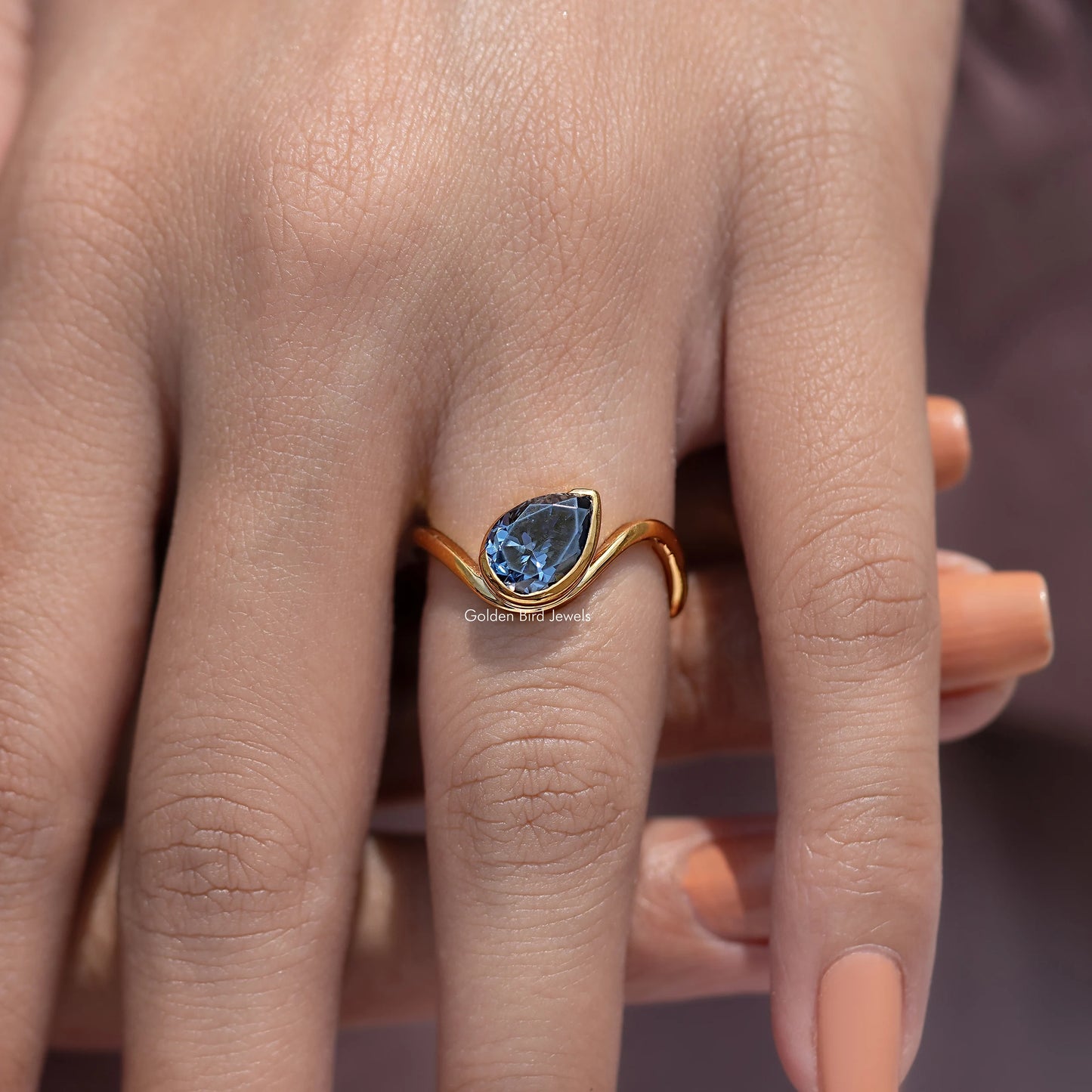 Pear Sapphire Moissanite Curved Solitaire Ring