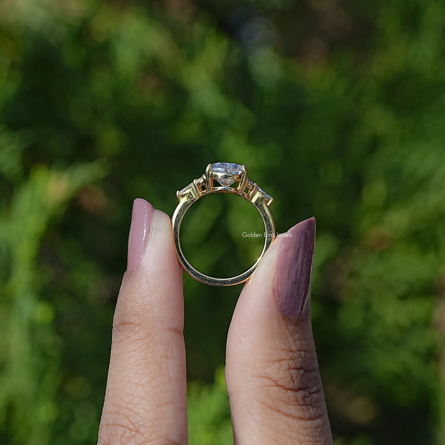 Back view of Pear cut moissanite Accent engagement ring  
