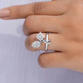 Close View Of Pear And Princess Cut Moissanite Ring
