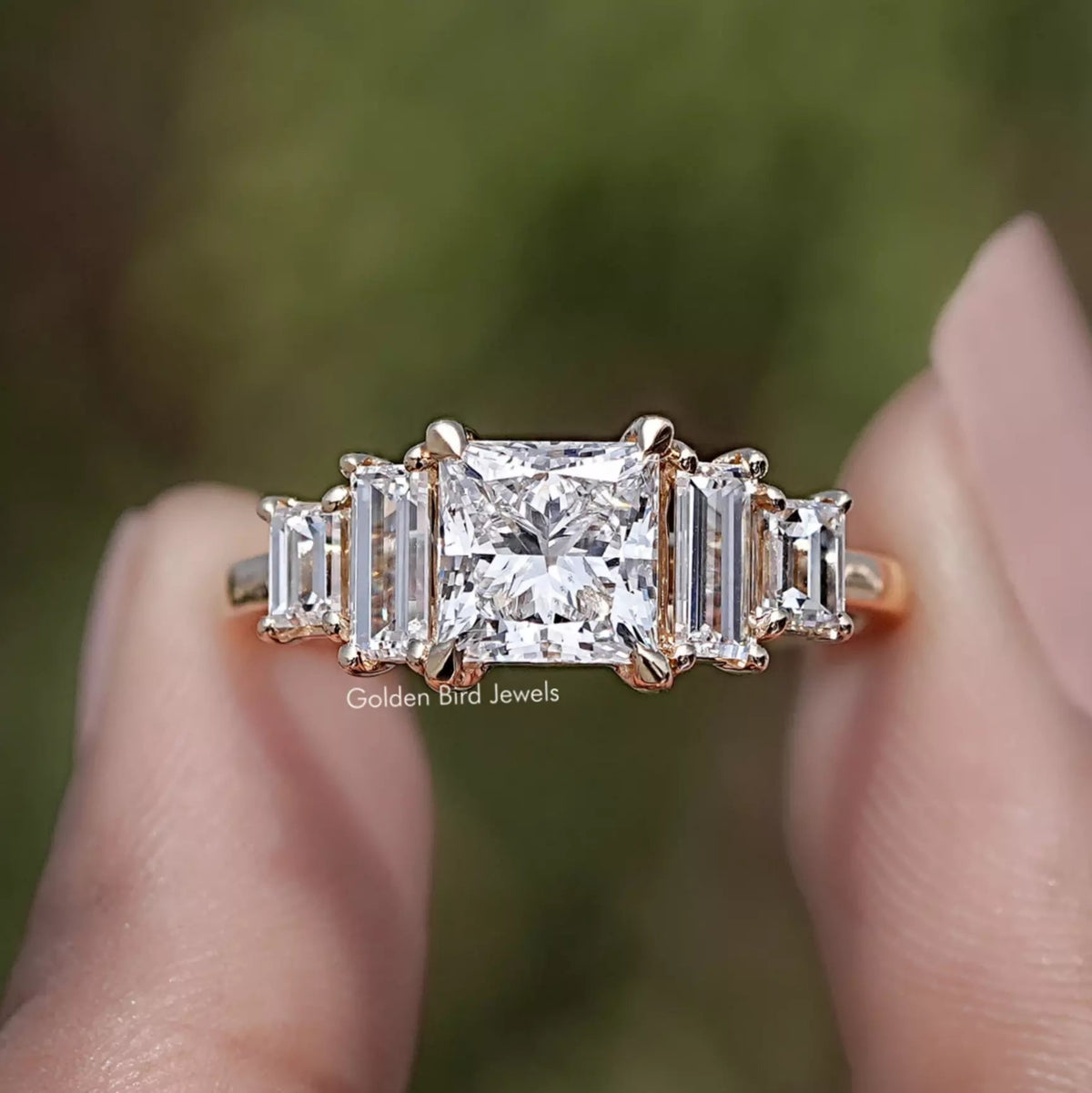Princess And Baguette Lab Diamond Five Stone Ring In Two Fingers
