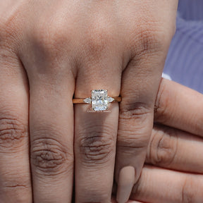 View of Radiant Cut Three Stone Engagement Ring in prongs setting