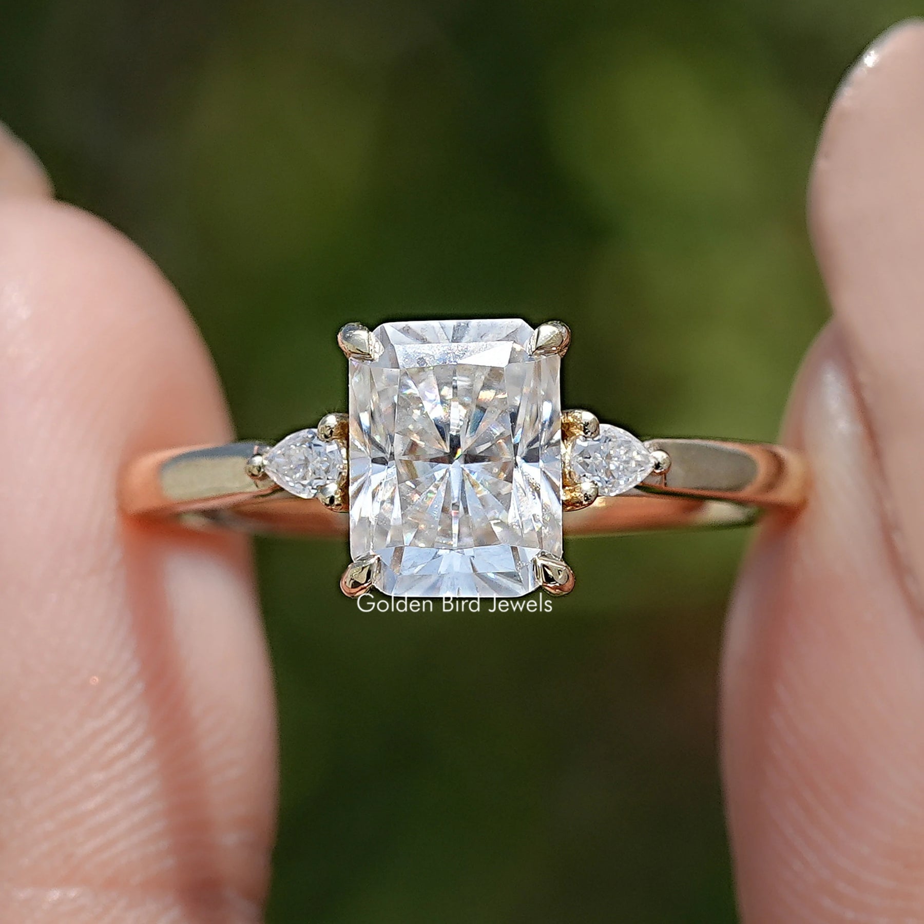 Front view of Radiant Cut Moissanite Three Stone Engagement Ring