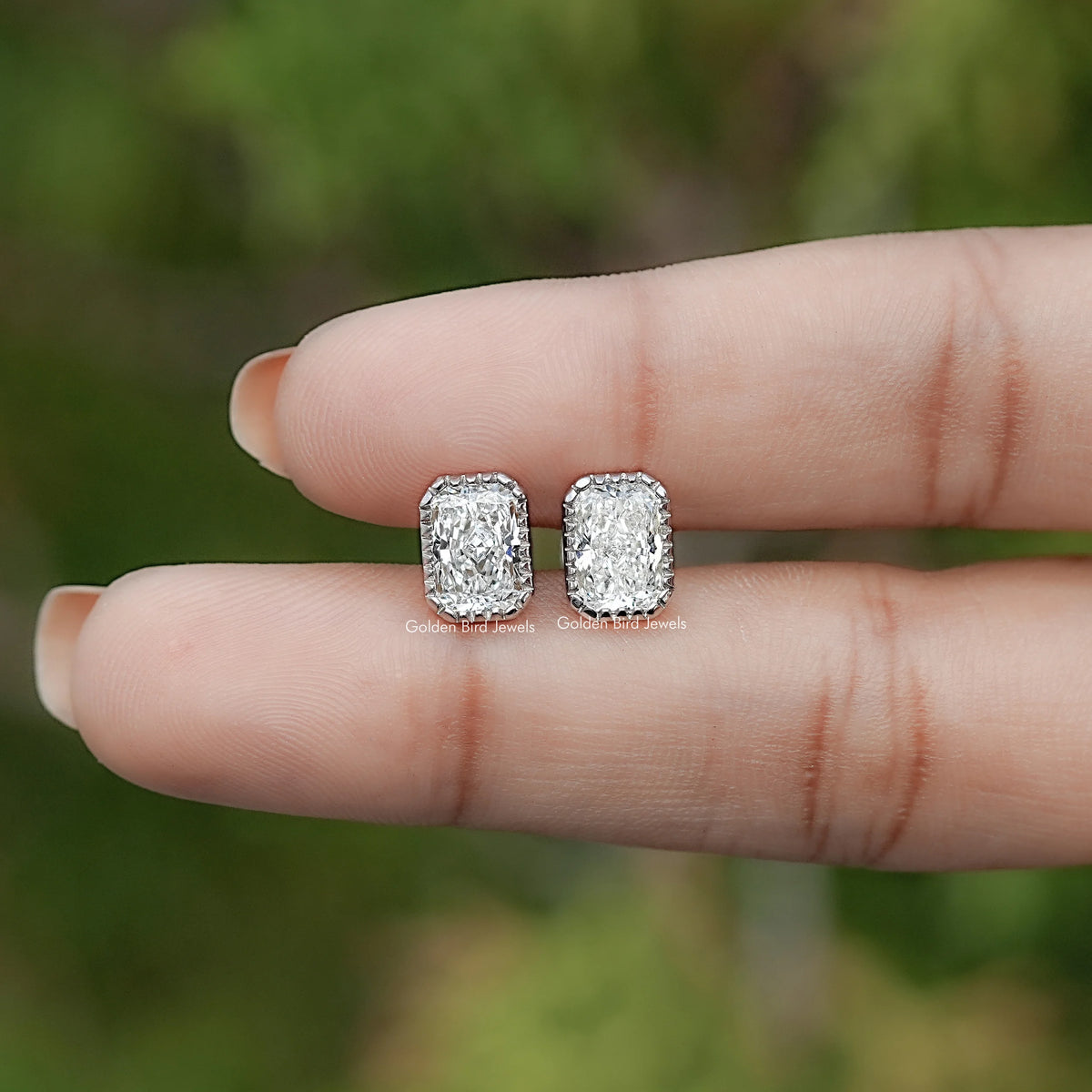 In Hand View Of Radiant Cut Lab Diamond Stud Earrings