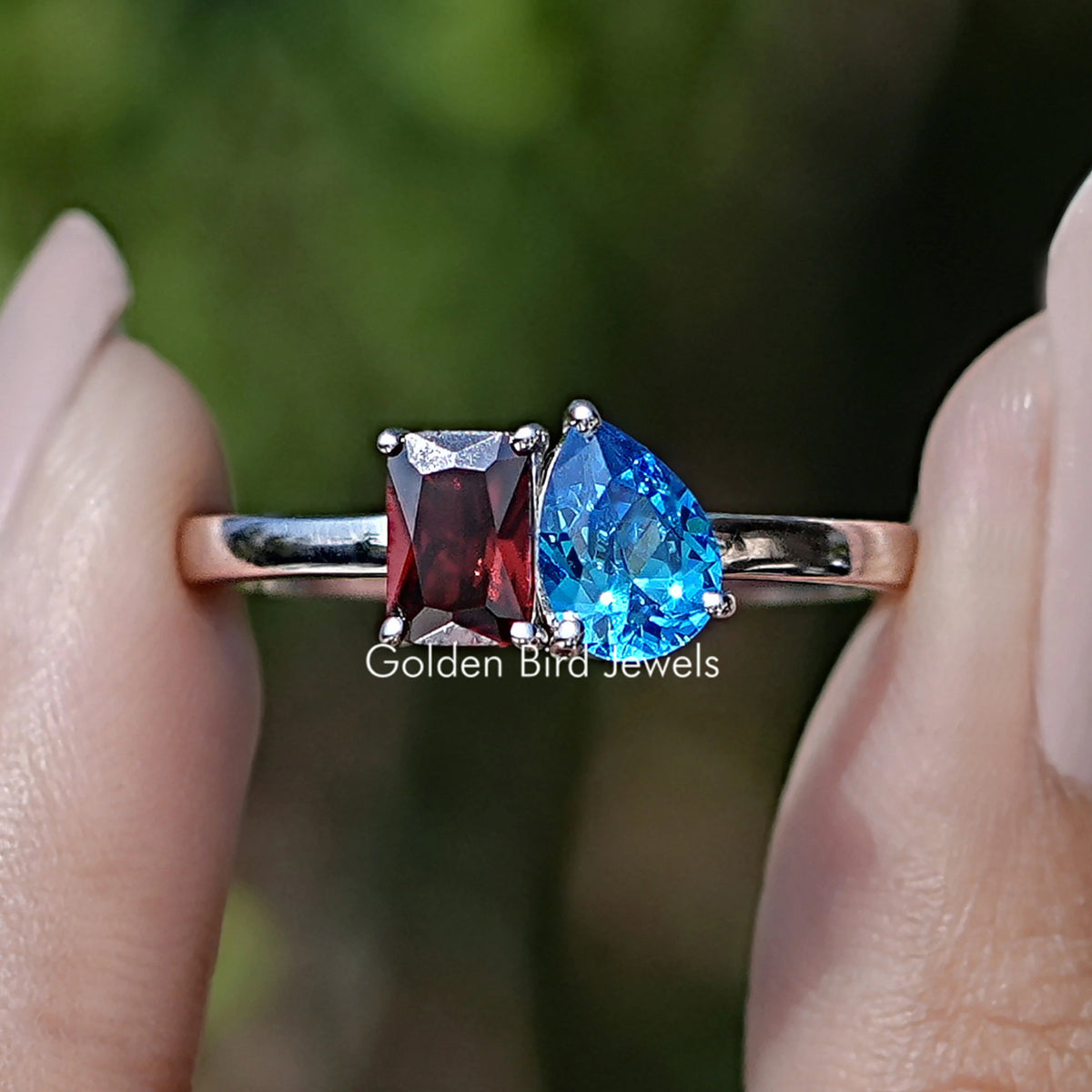 Front view of Moissanite Engagement Ring in Radiant and Pear Cut Stones