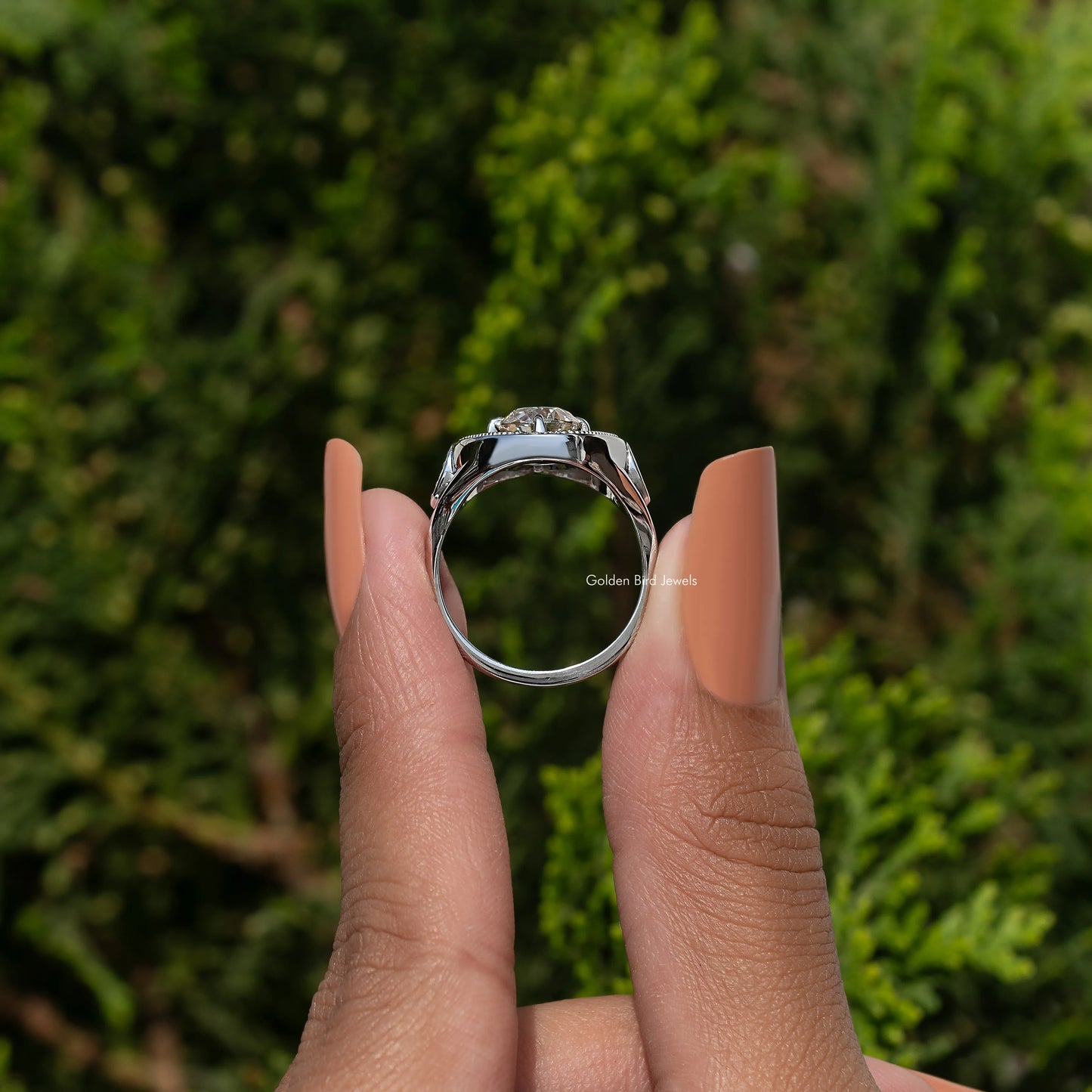 Old European Round And Tapered Baguette Halo Ring