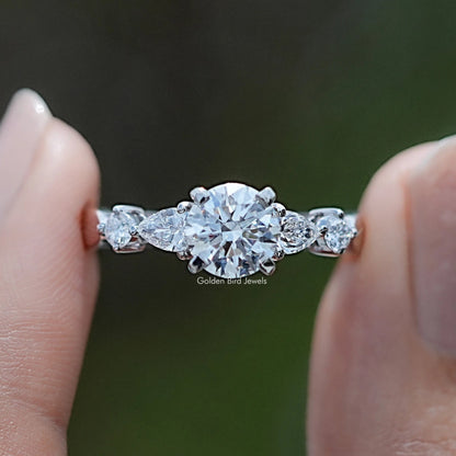 Round And Pear Cut Lab Diamond Five Stone Ring In Two Fingers
