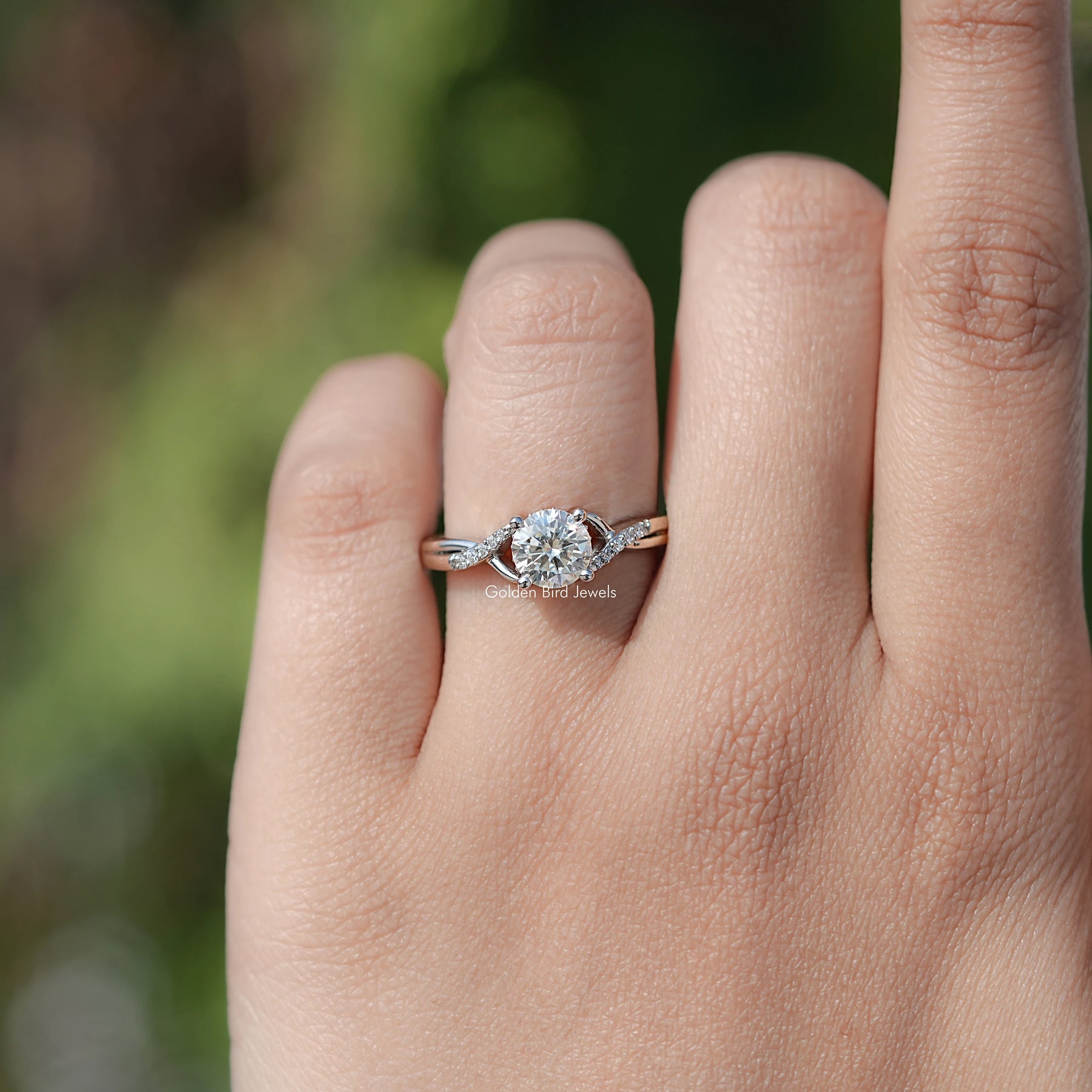Top View Of Round Moissanite Criss Cross Accent Engagement Ring
