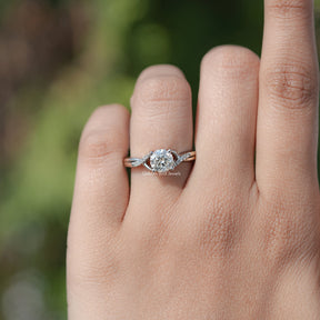Top View Of Round Moissanite Criss Cross Accent Engagement Ring
