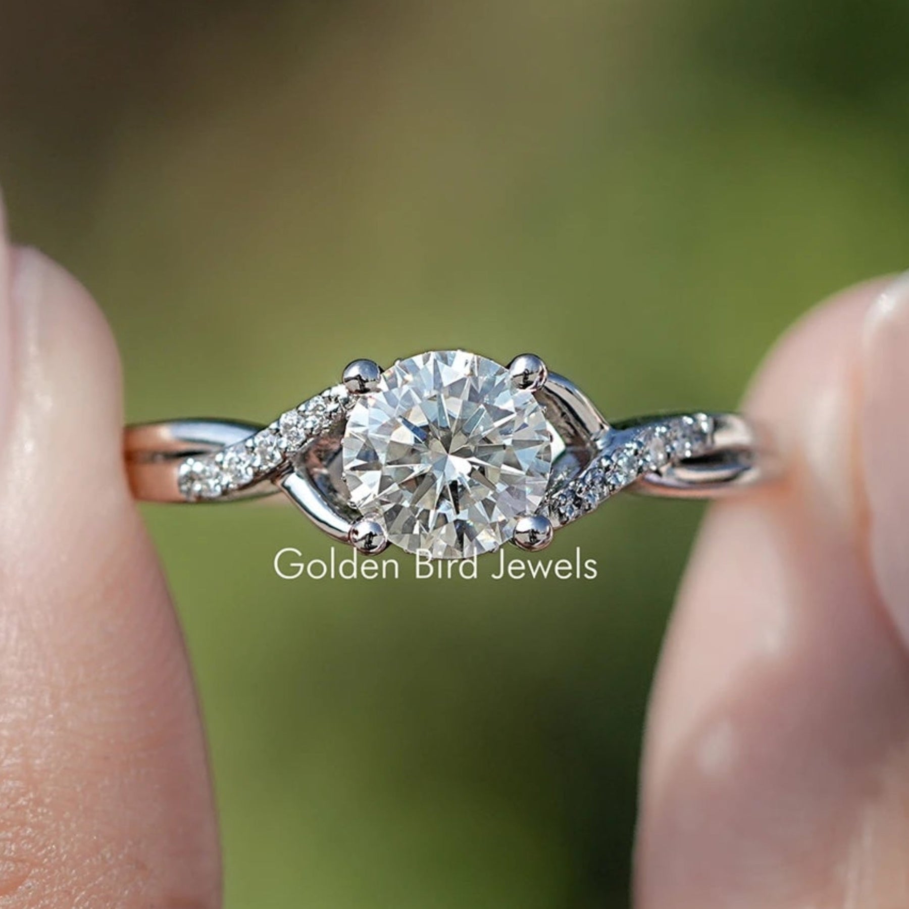 Front View of Round Moissanite Criss Cross Accent Engagement Ring