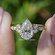 Front view of Pear Shaped Moissanite Accent Engagement Ring
