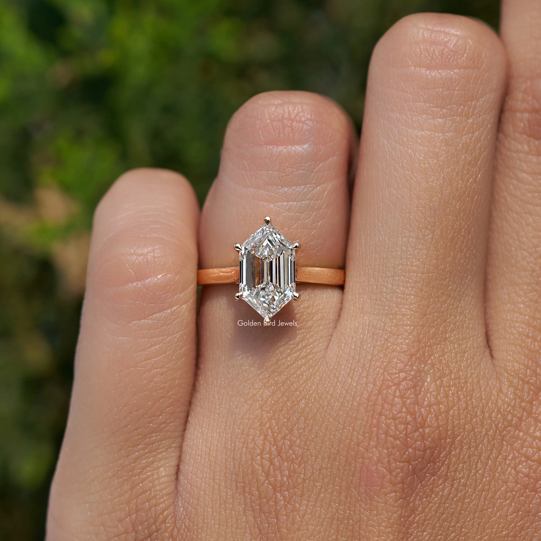 Front View of Step cut marquise Diamond Ring on hand